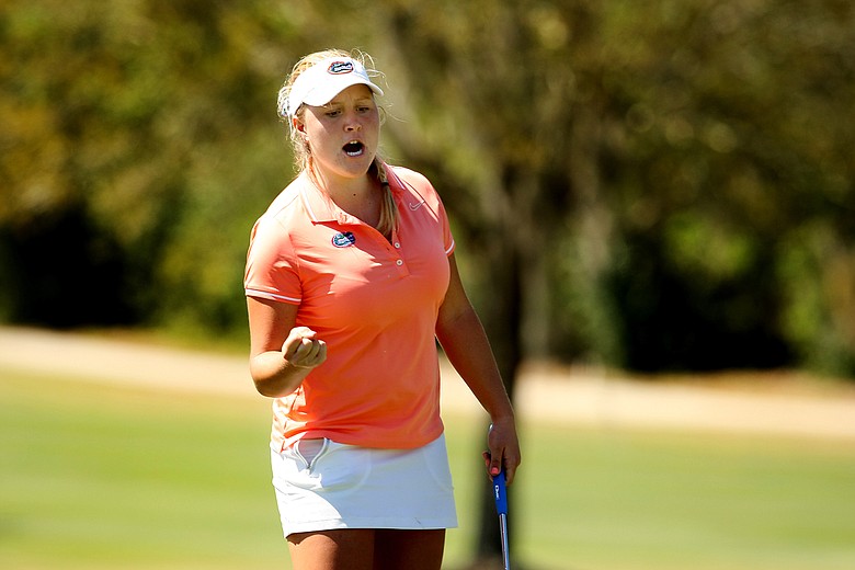 Florida's Camilla Hedberg reacts to making par at the tough No. 12 during the Sun Trust Gator Women's Invite at Mark Bostick Golf Course.