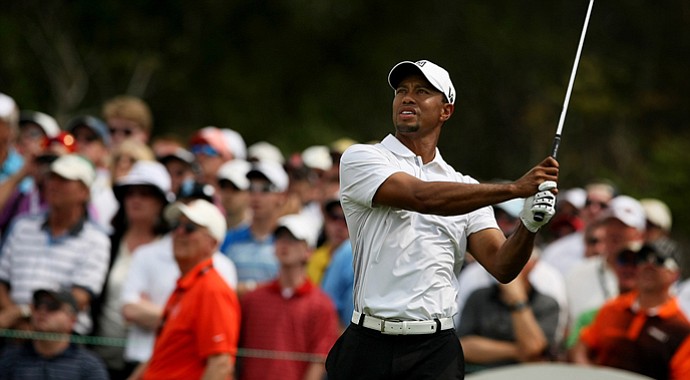 Tiger Woods hits his tee shot at No. 7 on Saturday at Arnold Palmer Invitational.