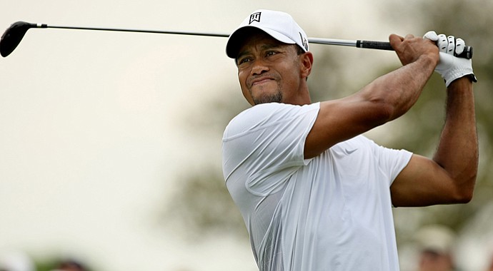 Tiger Woods hits his tee shot at No. 8 on Saturday at the Arnold Palmer Invitational.