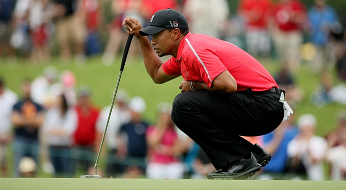 Tiger Woods looks over his putt at No. 2 in the final round at Arnold Palmer Invitational at Bay Hill.