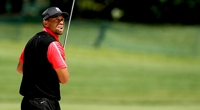Tiger Woods watches his bunker shot at No. 16 on Monday at Arnold Palmer Invitational at Bay Hill.