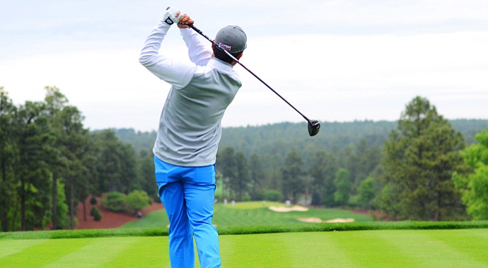 Tae Wan Lee hits his opening tee shot during the second round at the Junior Invitational on Saturday.