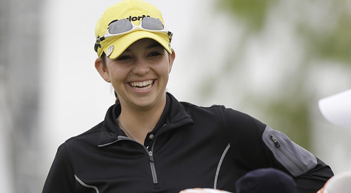 Taylor Coleman, 16, smiles before teeing off on the 10th hole during the second round of the North Texas LPGA Shootout.