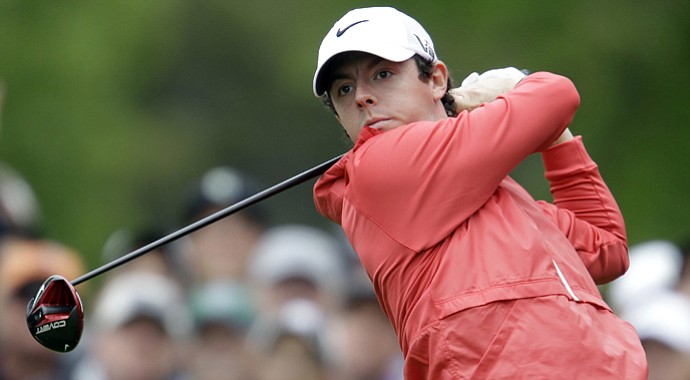 Rory McIlroy watches his tee shot on the fourth hole during the first round of the Wells Fargo Championship.