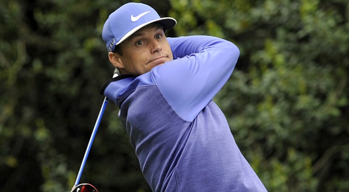 Nick Watney watches his tee shot on the 15th hole during the third round of the Wells Fargo Championship.