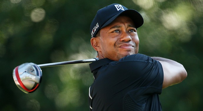 Tiger Woods plays a shot from the 11th tee during the second round of the Players Championship.