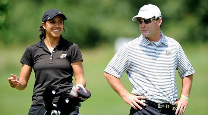 Greg Robertson, right, with Purdue senior Paula Reto.