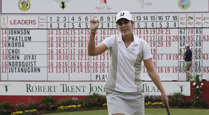 Jennifer Johnson acknowledges the crowd after completing play in the final round of the Mobile Bay LPGA Classic.