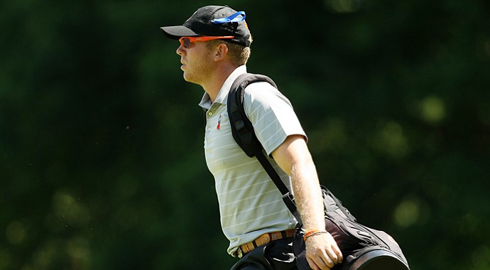 Oklahoma State's Talor Gooch walks up No. 15 during the Round 1 of the 2013 NCAA Championship at Capital City Club Crabapple Course. Gooch posted a 67.
