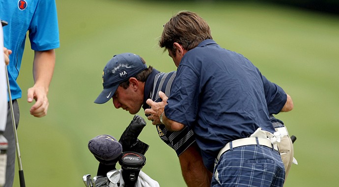 Cal's Max Homa is consoled by his father, John, after he lost his match in 20 holes to Illinois' Thomas Pieters during the semifinals of match play. Illinois advances to play Alabama in the final.