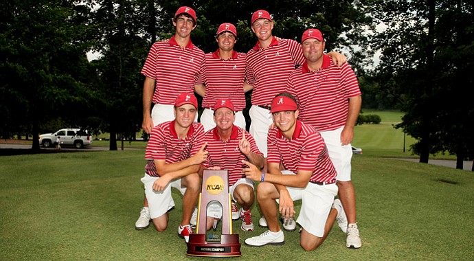 Alabama poses with the National Championship trophy. On the top row, from left, Scott Strohmeyer, Bobby Wyatt, Trey Mullinax and assistant coach Rob Bradley. On the bottom row, from left, Justin Thomas, head coach Jay Seawell and Cory Whitsett.