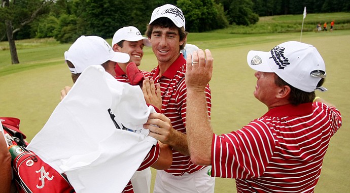 Scott Strohmeyer, center, along with Justin Thomas, Cory Whitsett and head coach Jay Seawell celebrate winning the 2013 NCAA Championship at Capital City Club Crabapple Course.