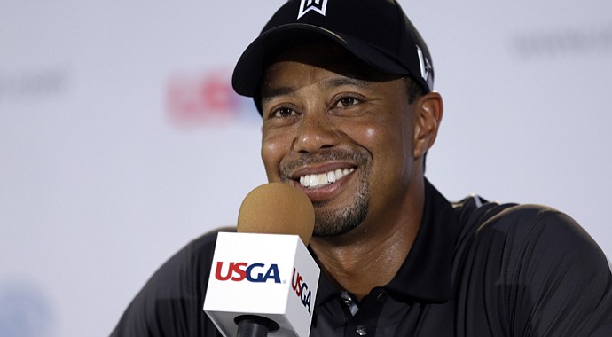 Tiger Woods speaks at a news conference as the sun came out for U.S. Open practice Tuesday at Merion GC in Ardmore, Pa.