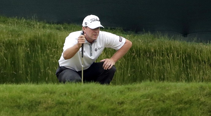 Steve Stricker lines up a putt on the 13th hole during the first round of the U.S. Open.