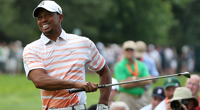 Tiger Woods grimaces after hitting his second shot on the eighth hole during the second round of the U.S. Open at Merion.