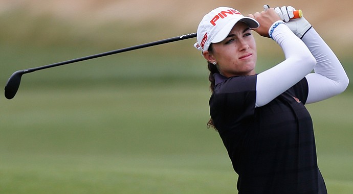 Casie Cathrea watches her shot from the 18th fairway during the final round of the 2013 U.S. Women's Open.