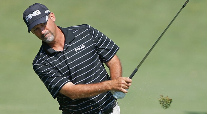 Stan Utley hits a shot to the 14th green during the first round of the 2013 U.S. Senior Open.