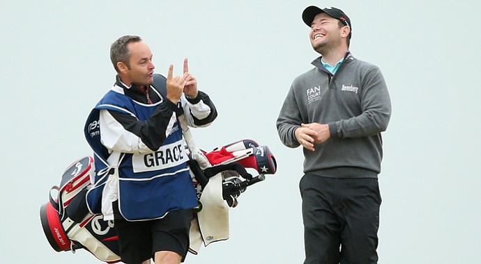 Branden Grace chats with his caddie Billy Foster prior to the Scottish Open. Grace would eventually lose in a sudden-death playoff in the duo's first tournament together.
