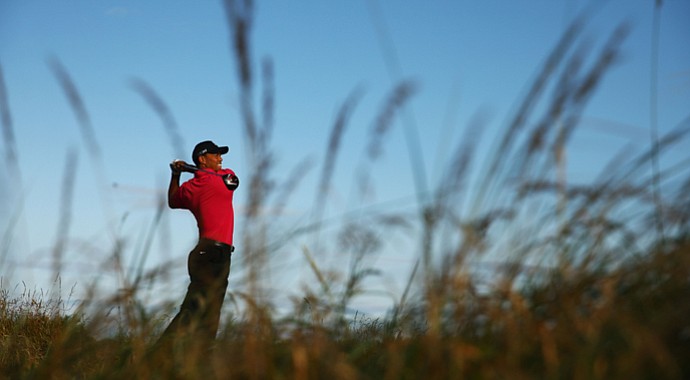Tiger Woods hits a shot ahead of the Open Championship at Muirfield.
