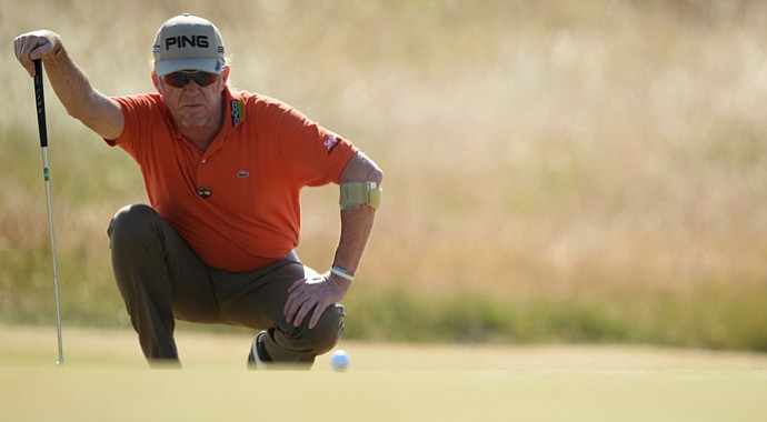 Miguel Angel Jimenez lines up a putt during the second round of the 142nd Open Championship at Muirfield.