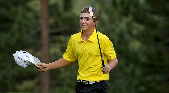John Augenstein walks off the green after defeating Brian Carlson 1 up during the Round of 16 at the 66th U. S. Junior Amateur Championship. Augenstein defeated Jim Liu in the earlier Round of 32.