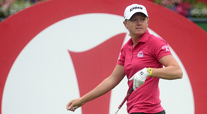 Stacy Lewis teed off early St. Andrews for the first round of the Women's British Open, but finished with 5-under 67.