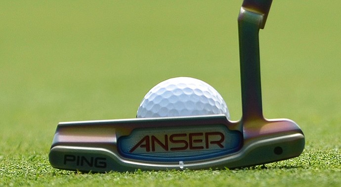 Bubba Watson's Anser Milled 1 putter has a unique copper-colored finish that reflects pink and purple hues in sunlight.