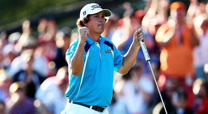 Jason Dufner celebrates on the 18th green after his two-stroke victory at the 95th PGA Championship at Oak Hill Country Club.