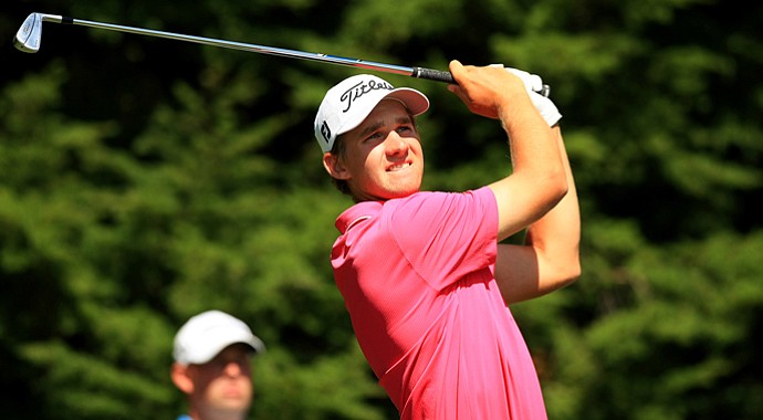 Patrick Rodgers hits his tee shot at No. 12 during the Round of 64 at the 2013 U. S. Amateur at The Country Club.