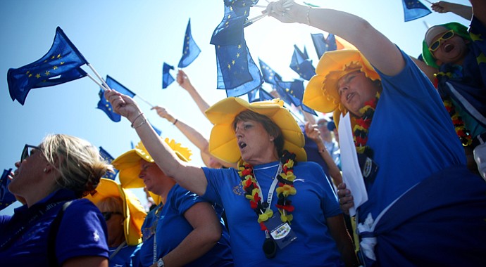 Fans of the European team cheer during the final day singles matches of the 2013 Solheim Cup.