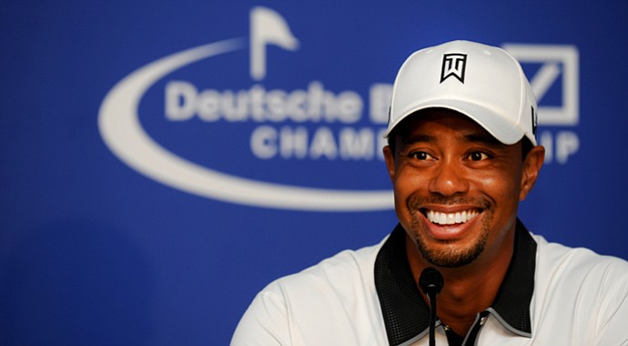 Tiger Woods speaks to the media during his press interview after his pro-am round at the Deutsche Bank Championship at TPC Boston.