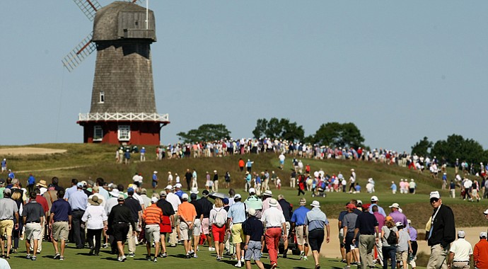 Spectators wander on Saturday of the 2013 Walker Cup at National Golf Links of America in Southampton, N.Y.