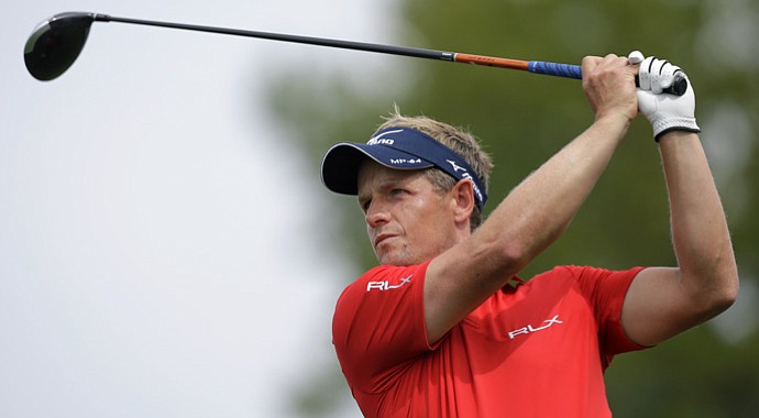Luke Donald watches a shot during The Barclays.