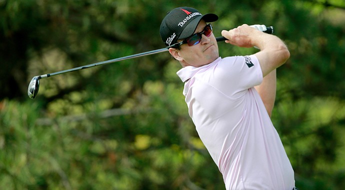 Zach Johnson hits off the 15th tee during the final round of the BMW Championship at Conway Farms.
