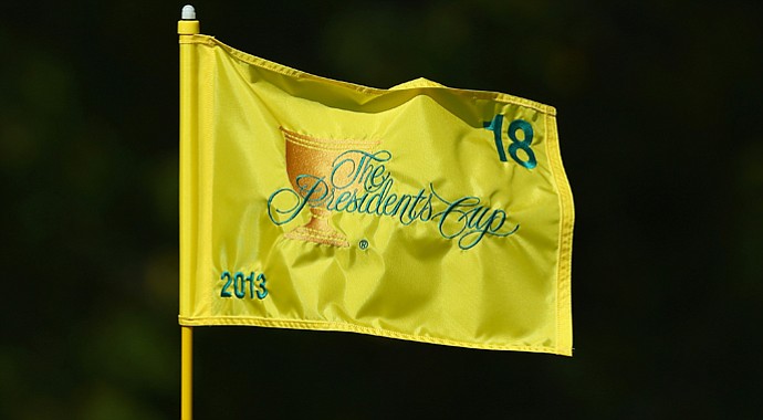 A Presidents Cup flagstick is seen on the 18th green prior to the start of the event at the Muirfield Village Golf Club.