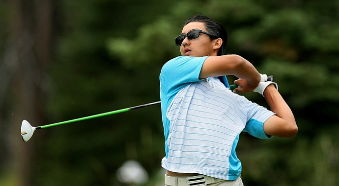 Zecheng Dou hits a shot during the U.S. Junior Amateur.