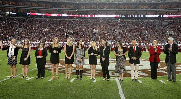 Emma Talley and her Alabama teammates receive their 2013 SEC Championship rings.