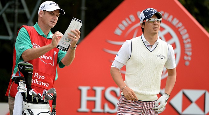 Ryo Ishikawa with caddie Simon Clarke at the HSBC Champions on Thursday.