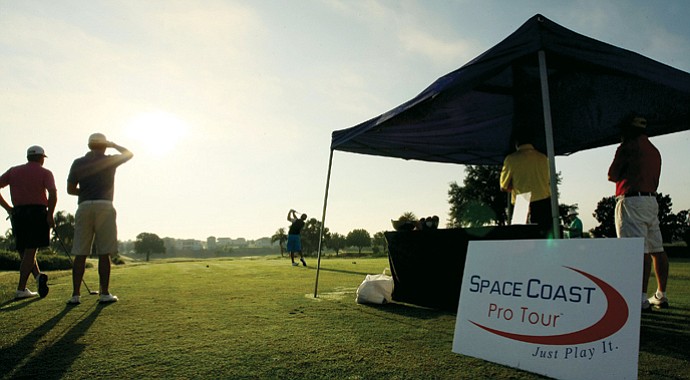 Golfers tee off during a Space Coast Tour event at Reunion Resort.