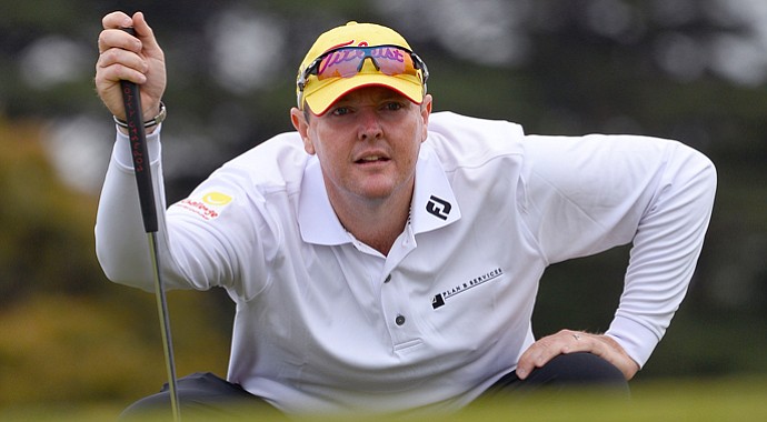 Leukemia survivor Jarrod Lyle shot an even-par 71 to make the 36-hole cut in his first tournament in 20 months.