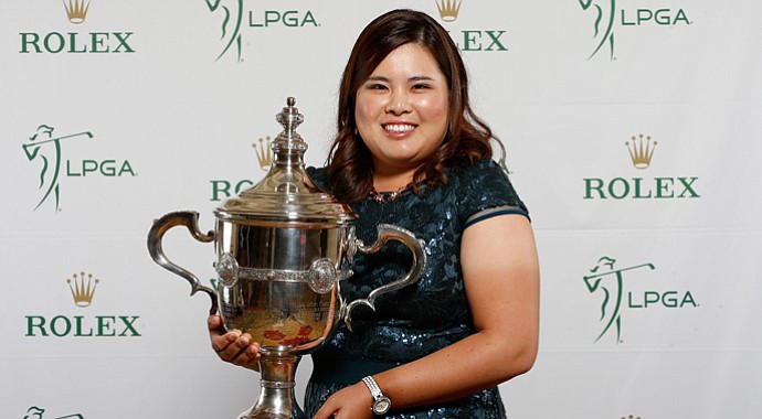 Inbee Park of South Korea poses with the Player of the Year trophy at the LPGA Rolex Awards reception at Tiburon Golf Club in Naples, Florida.