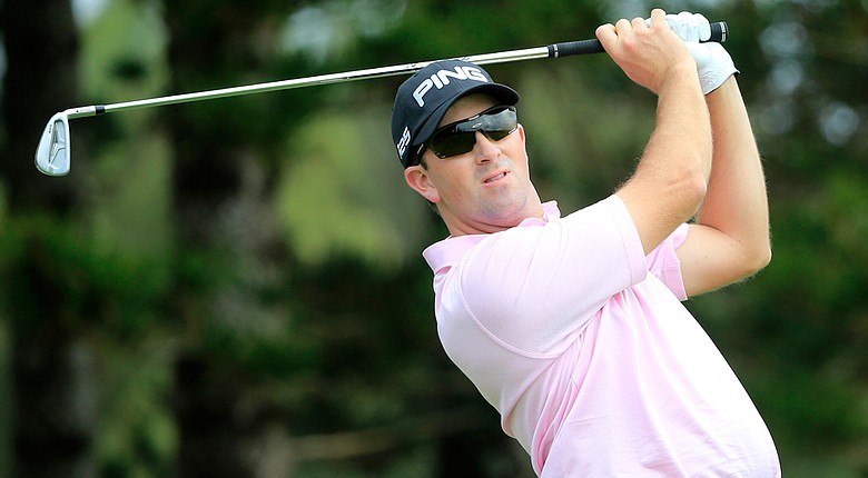Michael Thompson plays a shot on the 2nd hole during the first round of the Hyundai Tournament of Champions.