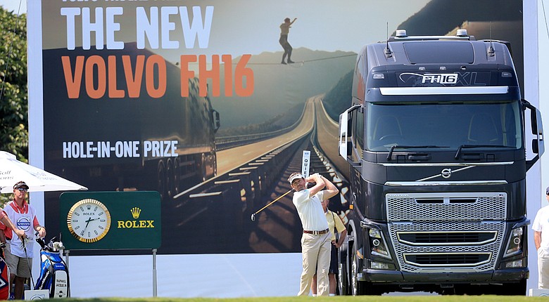 Rafael Jacquelin plays his tee shot at the par-4 18th hole during the first round of the Volvo Golf Champions.