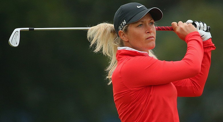 Suzann Pettersen plays an approach shot during the first round of the Australian Open. Pettersen fired a 6-under 66 to take the first-round lead.
