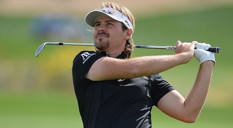 Victor Dubuisson defeated Bubba Watson on Friday to advance to Saturday's quarterfinals at the WGC-Accenture Match Play Championship.