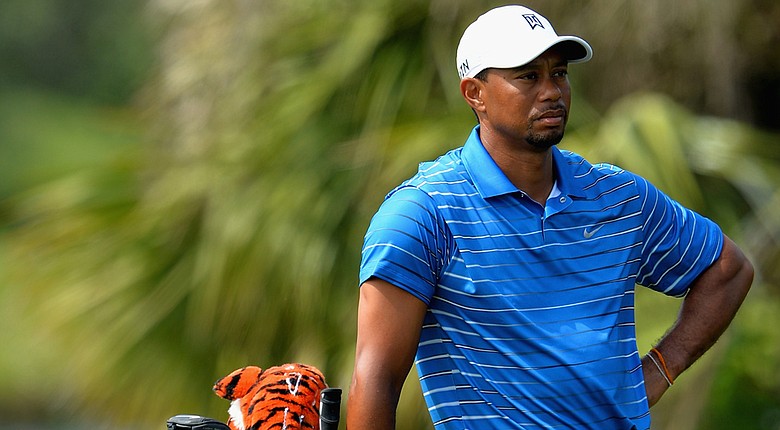 Tiger Woods looks on during the first round of The Honda Classic at PGA National. Woods shot a 1-over 71.