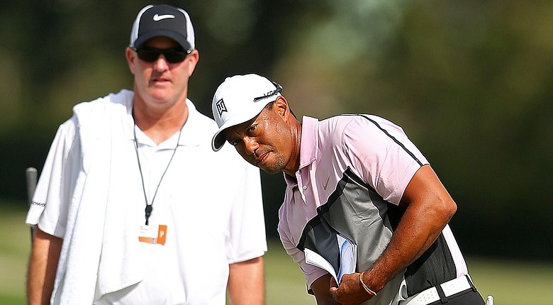 Tiger Woods said he was limited to shots of 60 yards and less during his preparation Wednesday for the 2014 WGC-Cadillac Championship at Trump National Doral.
