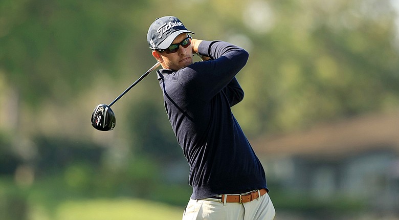 Adam Scott carded a tournament-record tying 10-under 62 during the first round of the Arnold Palmer Invitational at Bay Hill Club and Lodge.