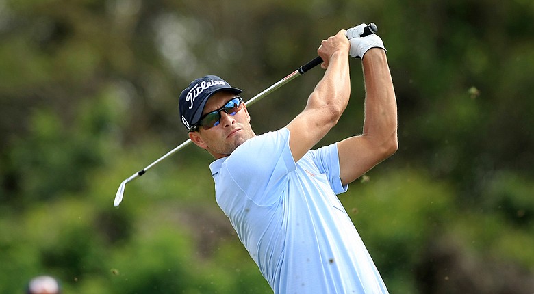 Adam Scott hits his tee shot at No. 3 during Round 2 of the Arnold Palmer Invitational Friday at Bay Hill Club and Lodge.