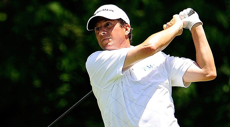 Billy Andrade fired a 7-under 65 to jump into a share of the lead with Fred Couples in Mississippi.